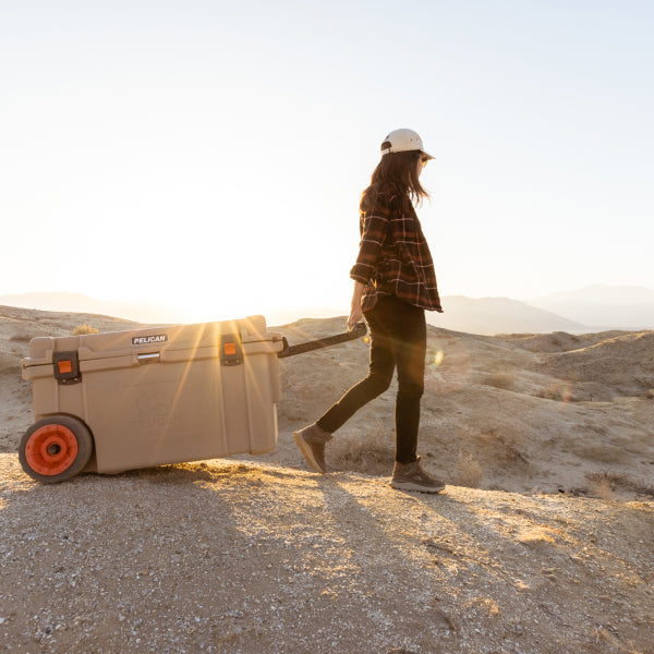Outdoor Tan Pelican 65QT Wheeled Cooler Desert