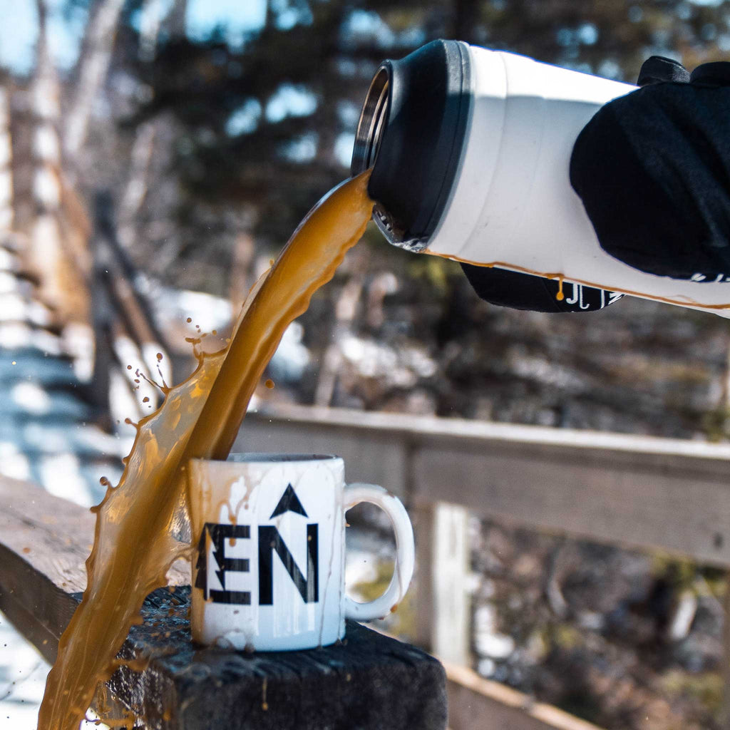 White 64oz Pelican Bottle Coffee Pouring