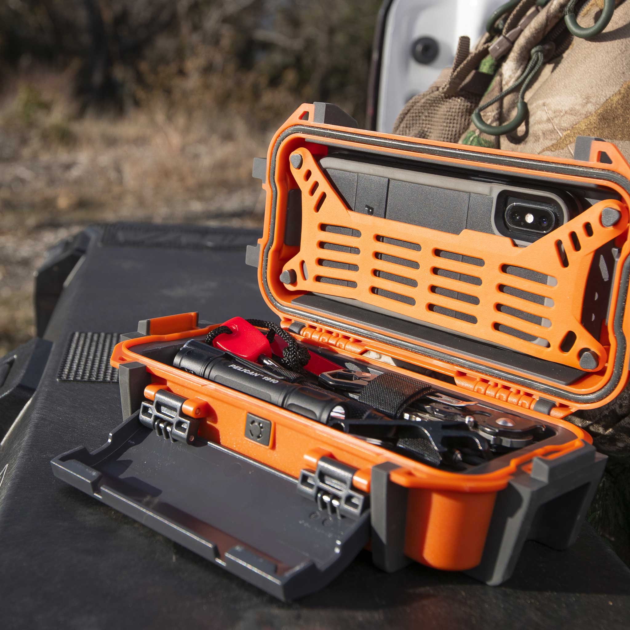 Orange Pelican R20 Ruck Case in truck bed