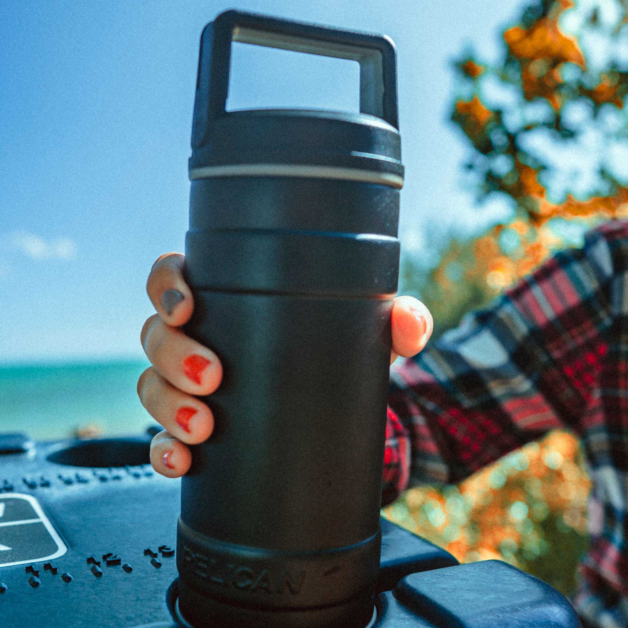 Black 18OZ Pelican Bottle inside Cupholder