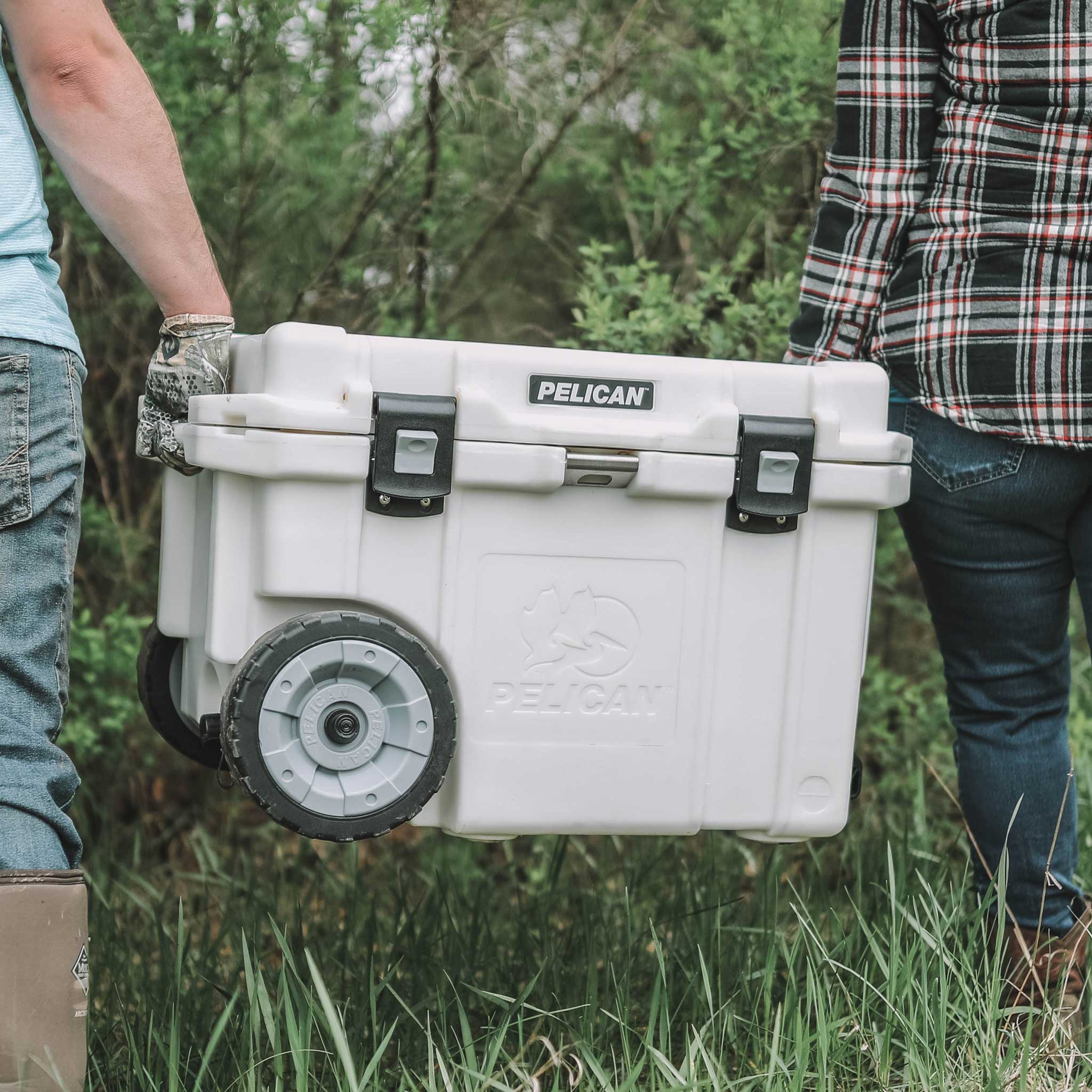 Marine White 45QT Elite Wheeled Pelican Being Carried