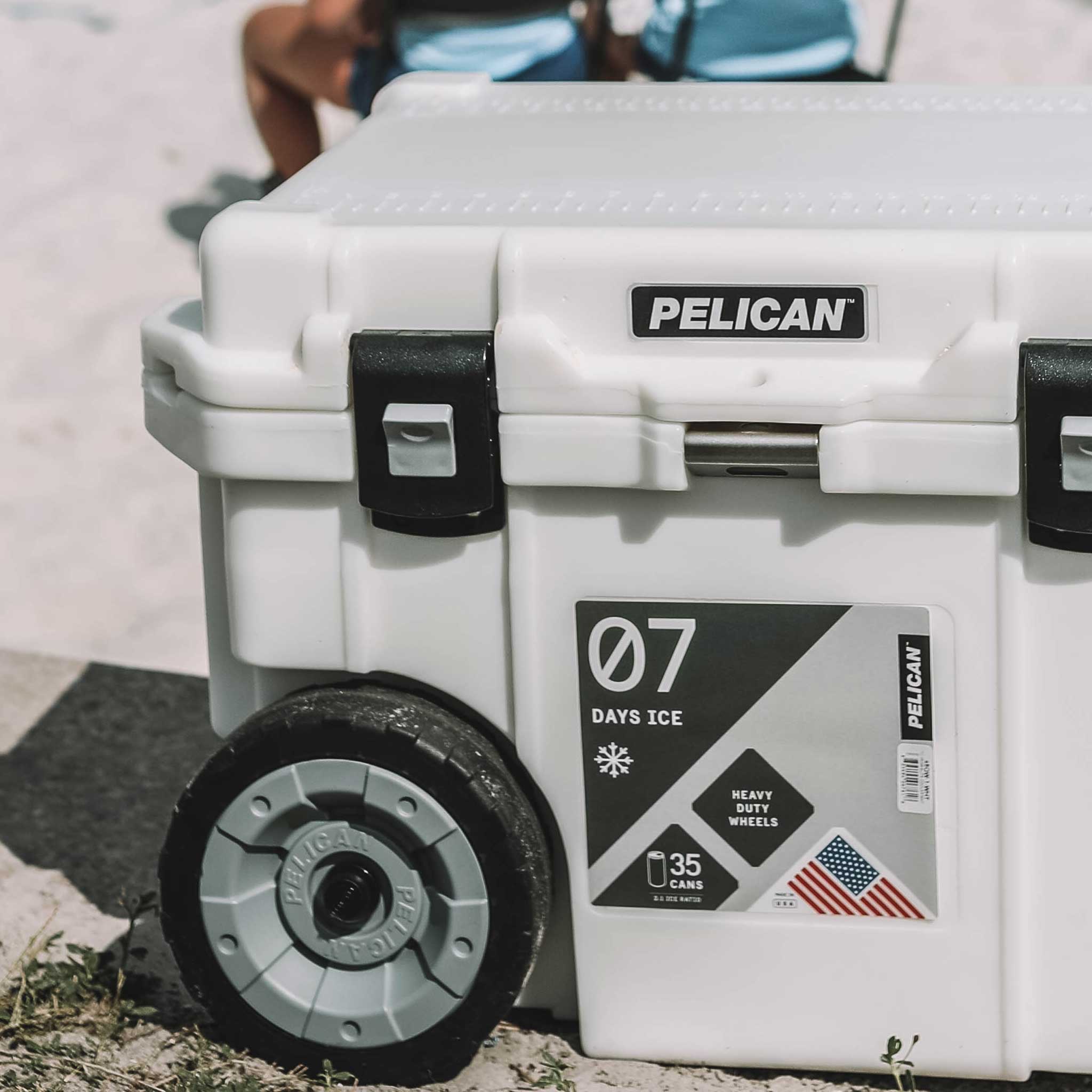 Marine White 45QT Elite Wheeled Pelican Cooler on Beach