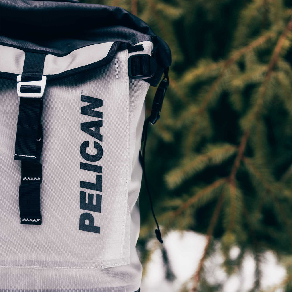 Light Grey Pelican backpack cooler in the snow